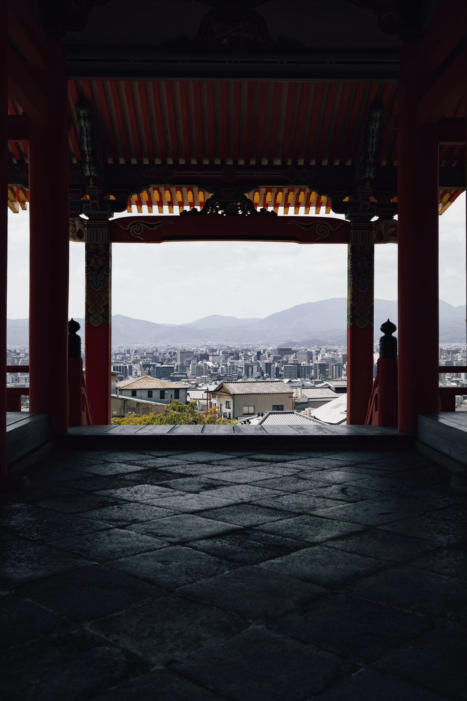 Kyoto framed by the dark beams of Kiyomizu